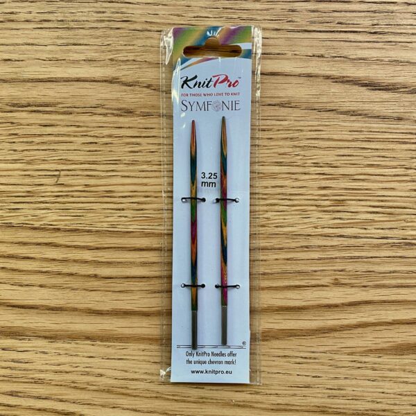 3.25mm knitting needle tips made from multi-coloured wood, packaged.