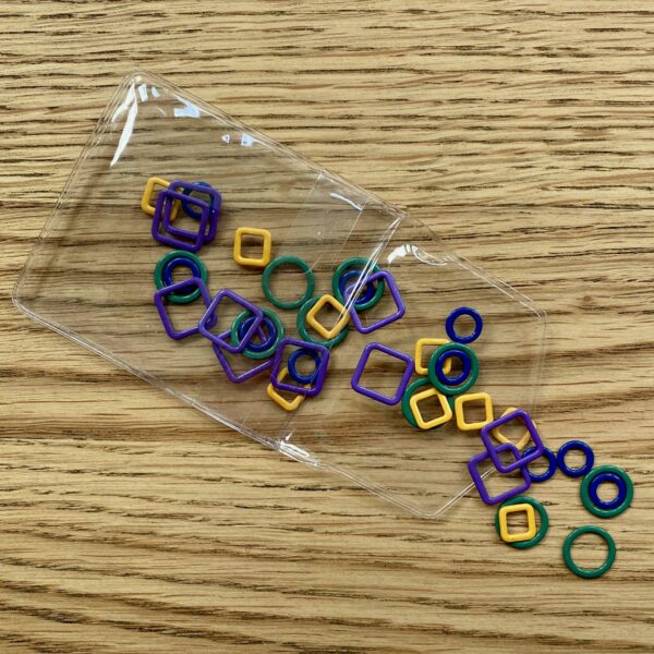 Green Yellow's Purple and blue stitch markers falling out of packaging knit pro