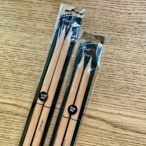 Close up tips of Knit Pro birch knitting needles in black packaging